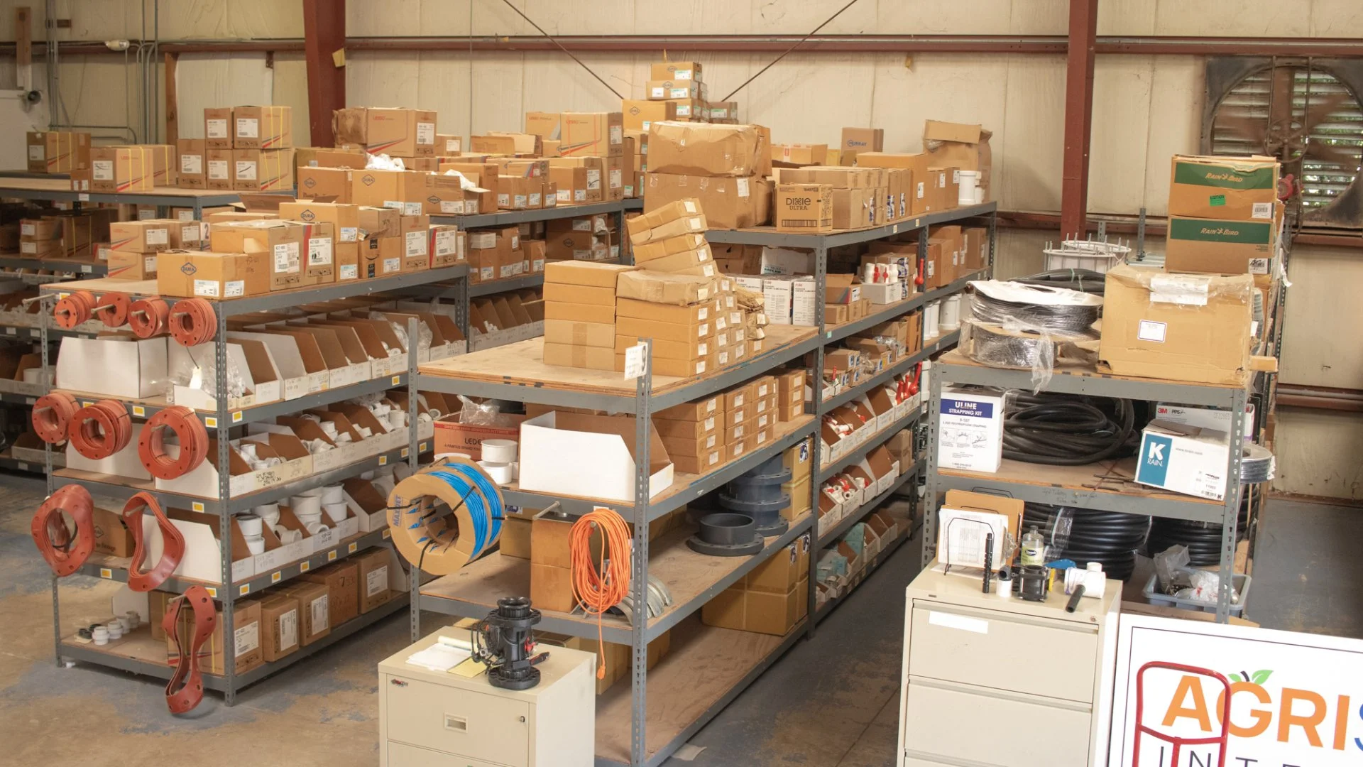 Warehouse shelves with irrigation system parts in Georgia.