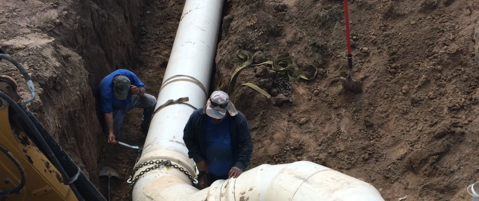 ASI workers installing an irrigation system inground in Warren County, KY.