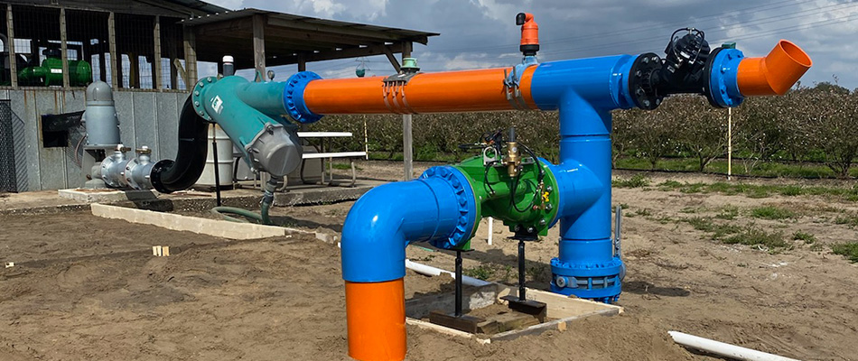 Turbine pump system next to crops in Central Florida. 